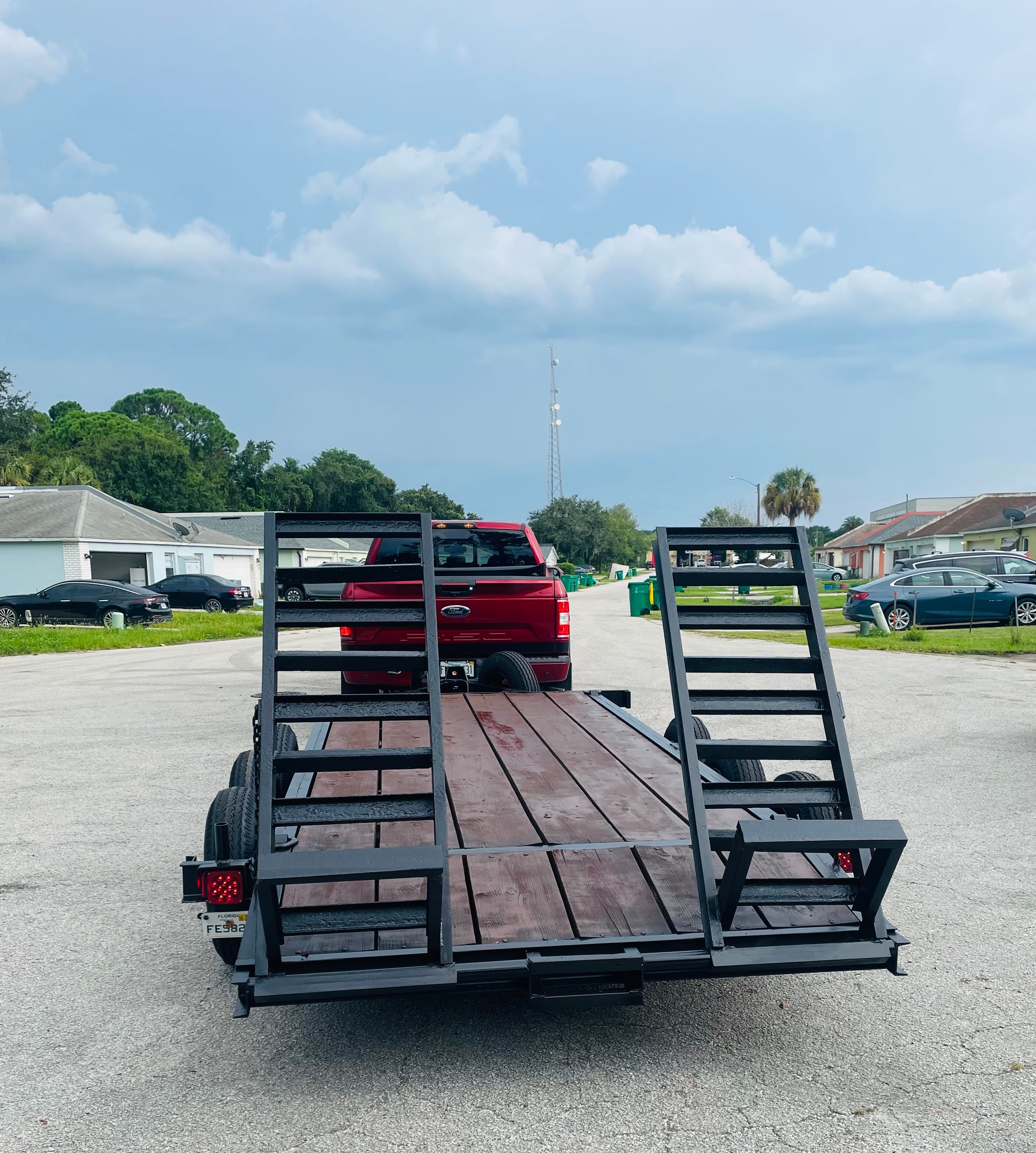 Utility trailer ready for rental at a Florida worksite